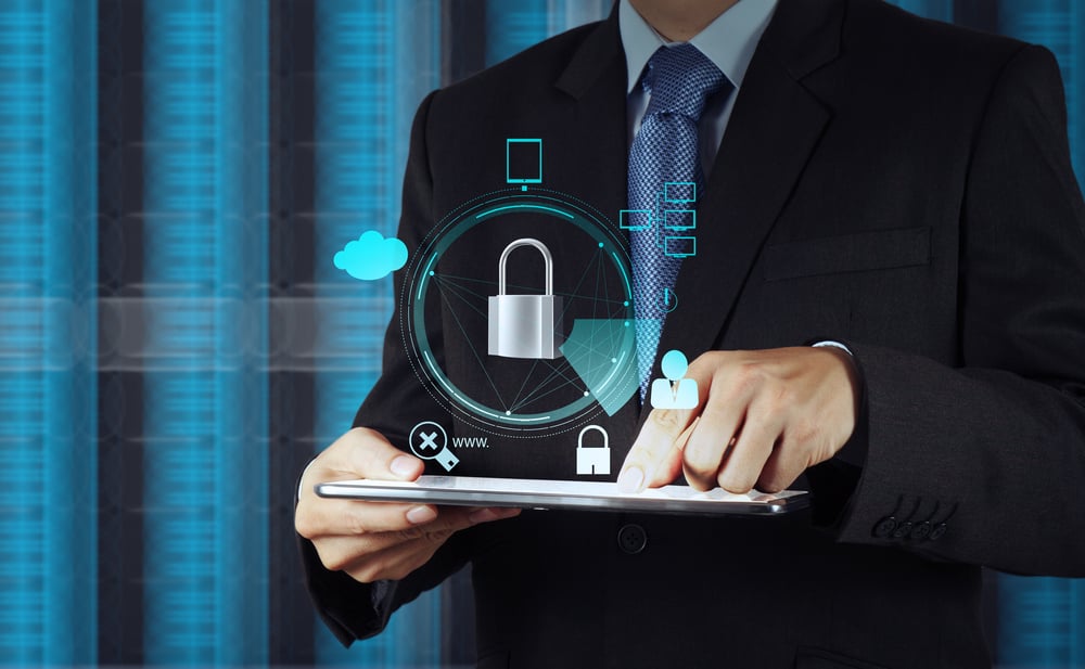 Padlocks, a businessman, and a tablet to symbolize cutting costs, strengthening security, and optimizing cloud investments.