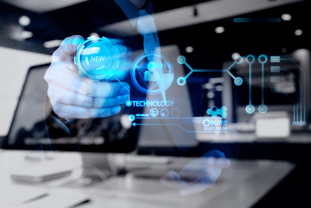 Double exposure of data security expert's hand pushing a button on a modern computer display to signify advanced technology for our post on the advantages of data encryption