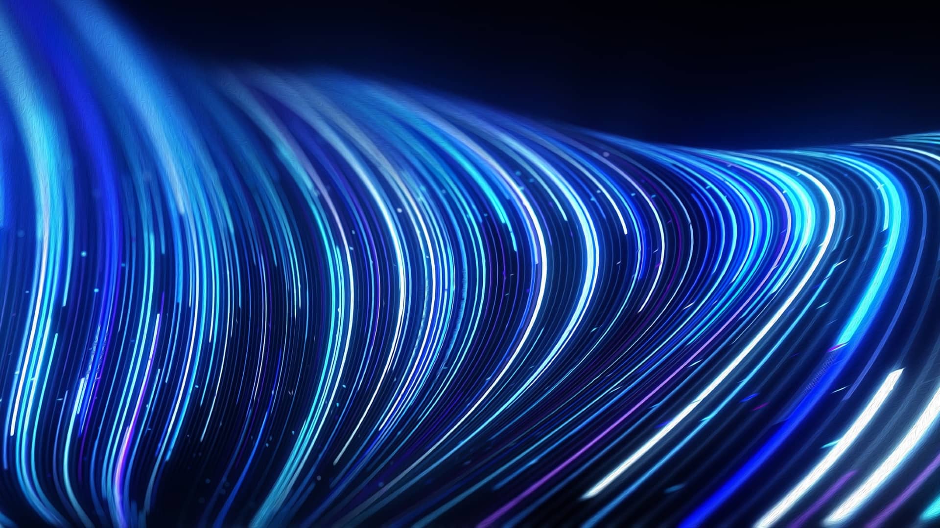 Abstract lines flowing dynamic pattern in blue colors on black background for concept of digital technology.